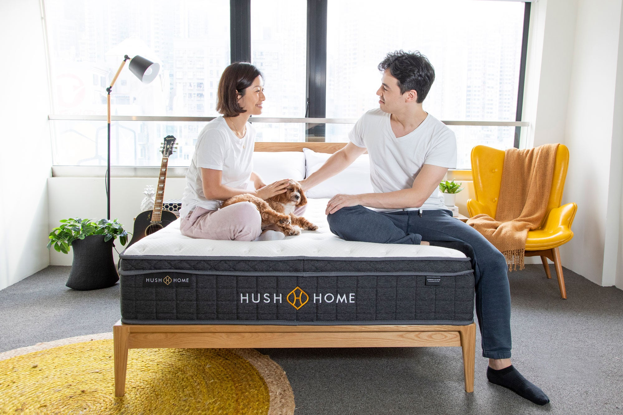 Couple on a standard size mattress by Hush Home